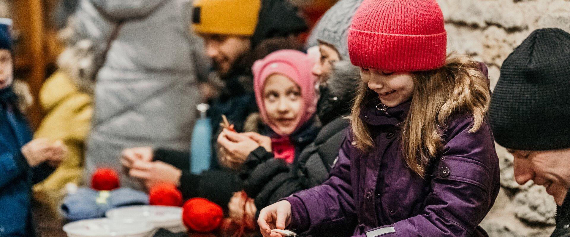 Children knitting at the Christmas Village in Narva